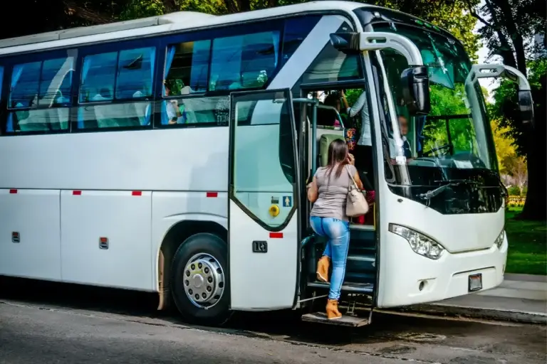 Woman Boarding Bus